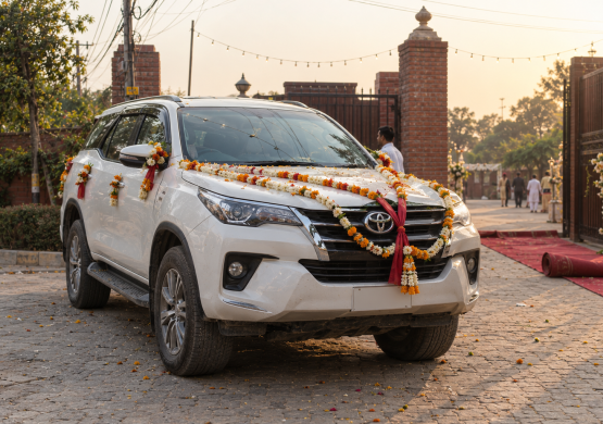 Decorated SUV at a Wedding Entrance