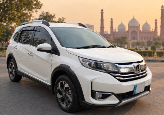 White SUV Before a Grand Mosque